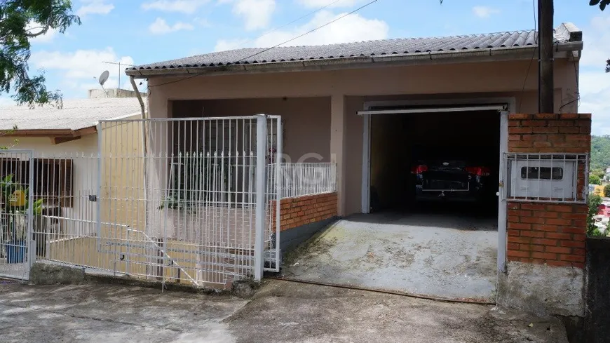 Foto 1 de Casa com 5 Quartos à venda, 281m² em Partenon, Porto Alegre