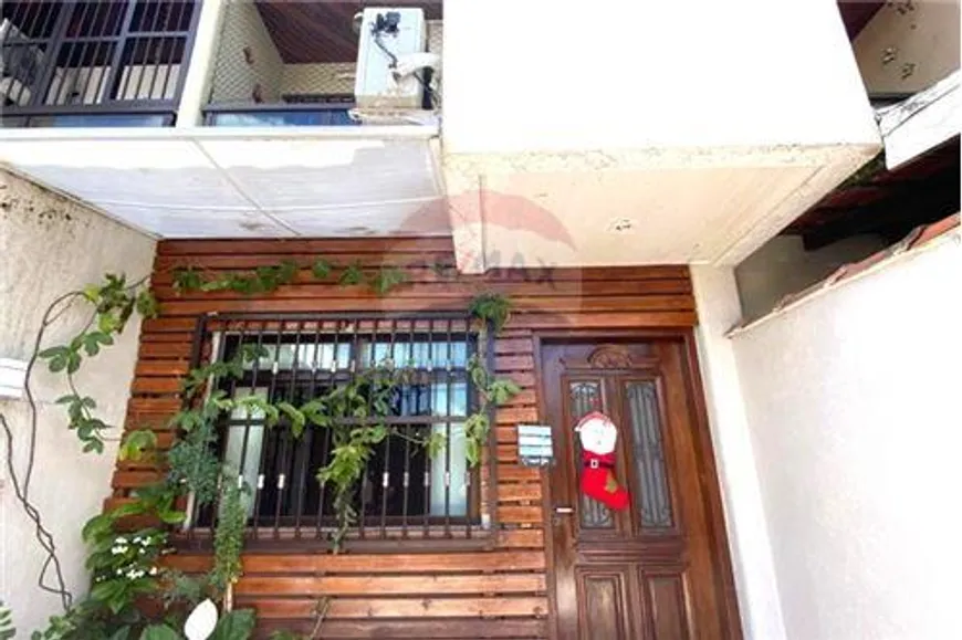 Foto 1 de Sobrado com 2 Quartos à venda, 98m² em Vila Santa Rosa, Guarujá