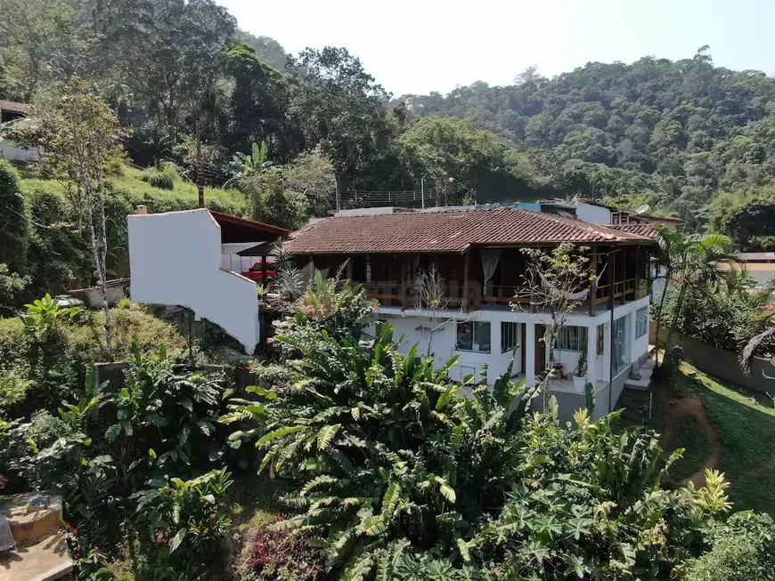 Foto 1 de Sobrado com 5 Quartos à venda, 240m² em Jardim Enseada, Ubatuba