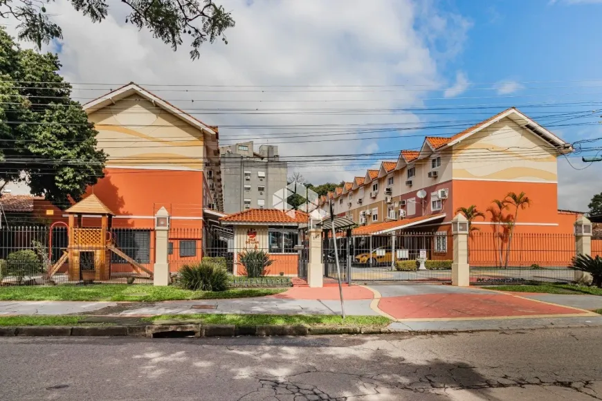 Foto 1 de Casa de Condomínio com 3 Quartos à venda, 92m² em Camaquã, Porto Alegre