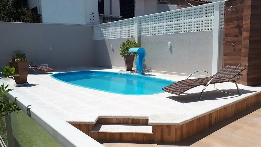 Foto 1 de Casa com 4 Quartos para alugar, 100m² em Canasvieiras, Florianópolis