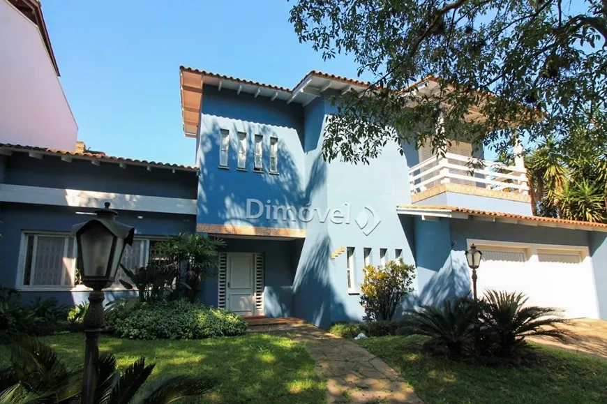 Foto 1 de Casa com 4 Quartos à venda, 391m² em Jardim Isabel, Porto Alegre