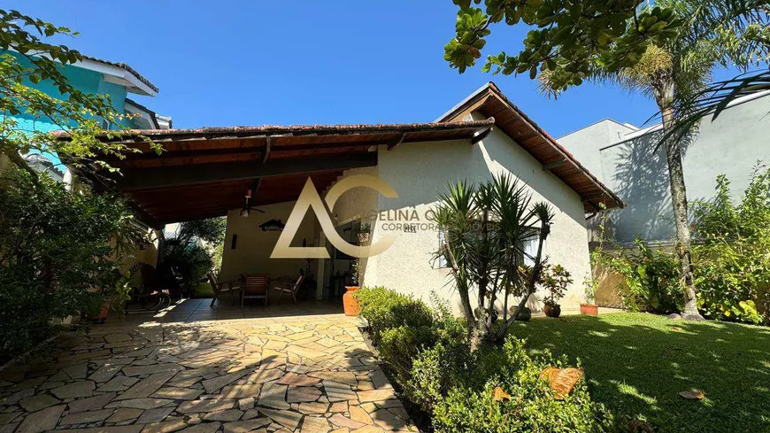 Foto 1 de Casa de Condomínio com 3 Quartos à venda, 380m² em Balneário Praia do Pernambuco, Guarujá