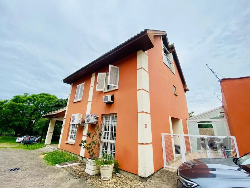 Foto 1 de Casa de Condomínio com 3 Quartos à venda, 147m² em Teresópolis, Porto Alegre