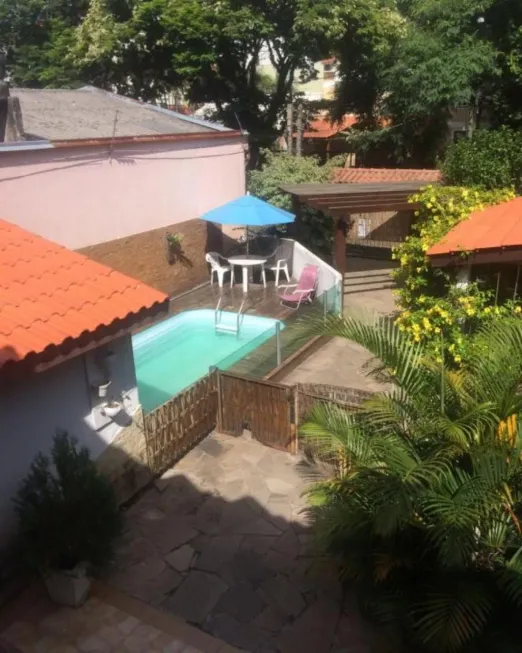 Foto 1 de Sobrado com 4 Quartos à venda, 210m² em Nonoai, Porto Alegre