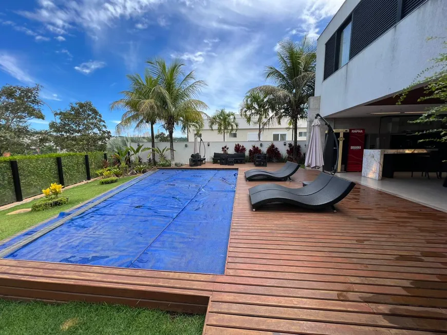 Foto 1 de Casa de Condomínio com 5 Quartos à venda, 447m² em Alphaville Flamboyant Residencial Araguaia, Goiânia