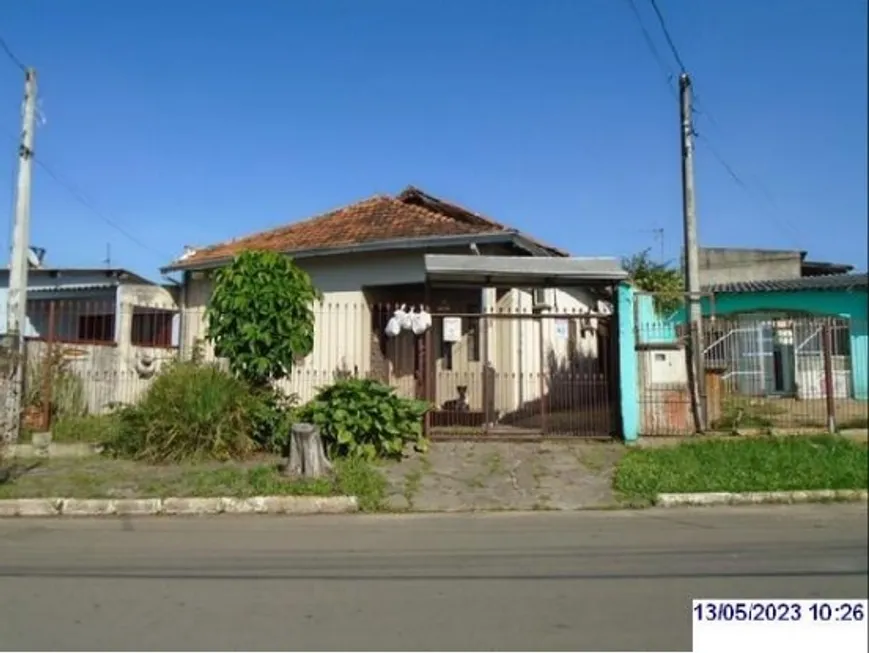 Foto 1 de Casa com 4 Quartos à venda, 152m² em Guajuviras, Canoas