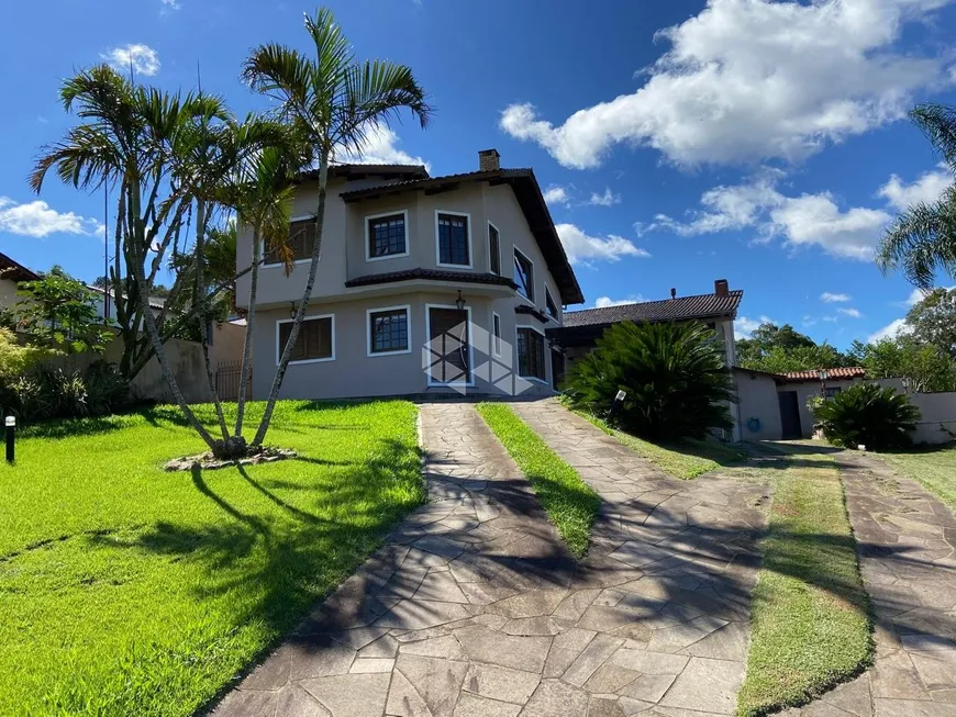 Foto 1 de Casa com 3 Quartos à venda, 249m² em Vila Nova, Porto Alegre