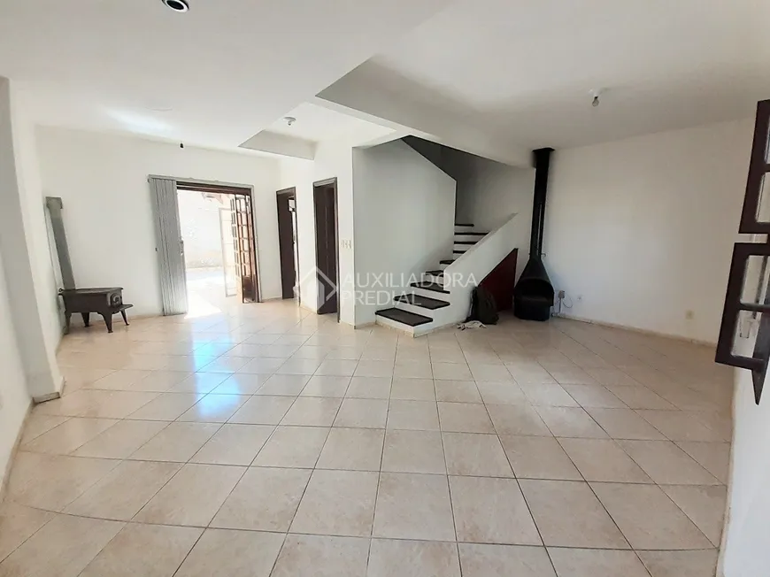 Foto 1 de Casa com 3 Quartos à venda, 153m² em Guarujá, Porto Alegre