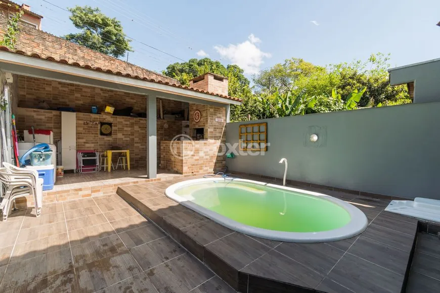 Foto 1 de Casa de Condomínio com 3 Quartos à venda, 114m² em Vila Nova, Porto Alegre