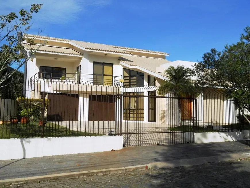 Foto 1 de Casa com 5 Quartos à venda, 324m² em Itacorubi, Florianópolis