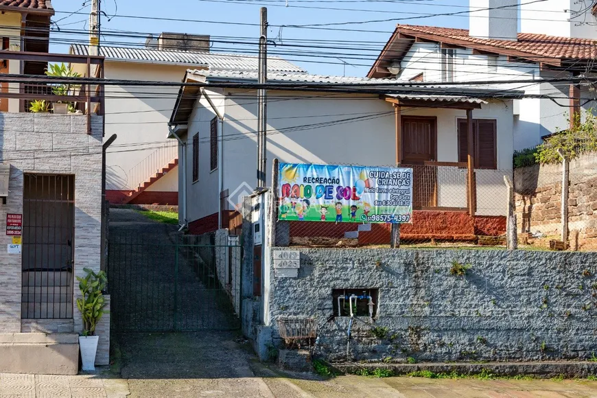 Foto 1 de Casa com 6 Quartos à venda, 182m² em Petrópolis, Novo Hamburgo