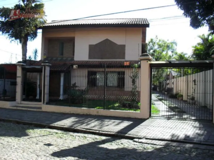 Foto 1 de Casa com 4 Quartos à venda, 274m² em Ipanema, Porto Alegre