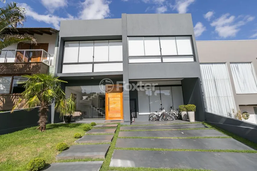 Foto 1 de Casa de Condomínio com 3 Quartos à venda, 270m² em Hípica, Porto Alegre