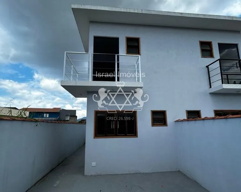 Foto 1 de Sobrado com 2 Quartos à venda, 84m² em Morro Do Algodao, Caraguatatuba