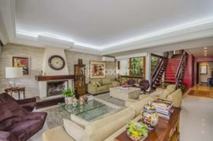 Foto 1 de Casa com 4 Quartos à venda, 328m² em Três Figueiras, Porto Alegre