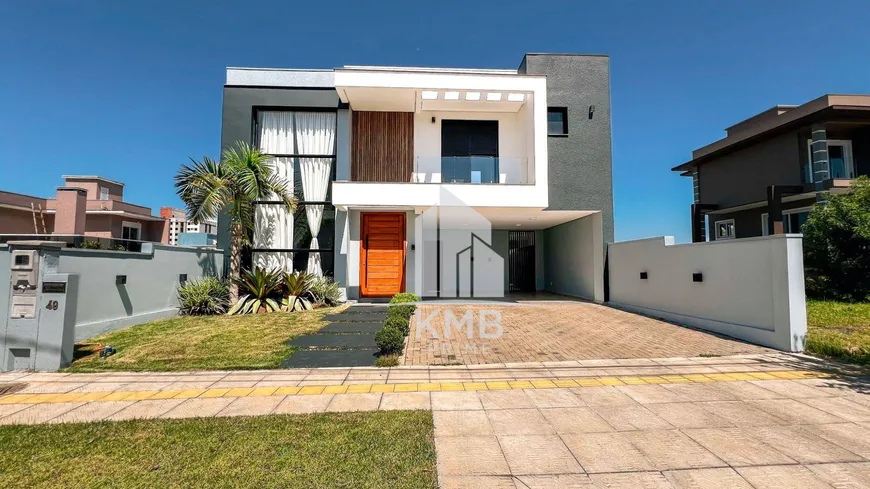 Foto 1 de Casa com 3 Quartos à venda, 186m² em Reserva do Arvoredo, Gravataí