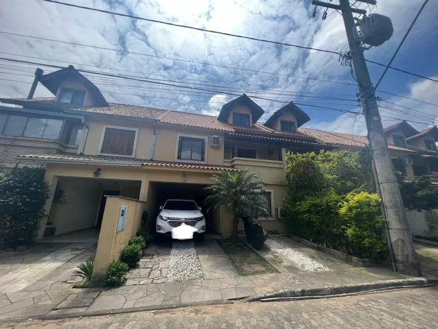 Foto 1 de Casa de Condomínio com 3 Quartos à venda, 121m² em Espiríto Santo, Porto Alegre