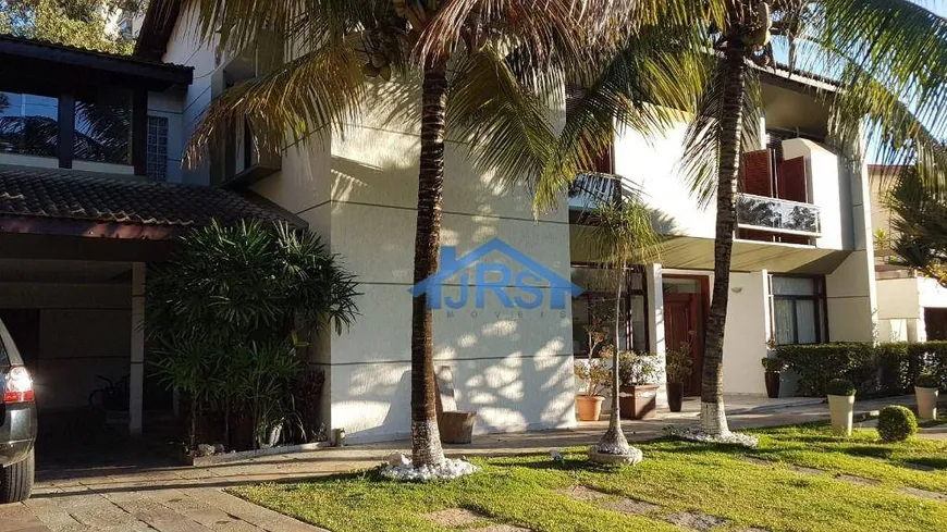 Foto 1 de Casa de Condomínio com 4 Quartos para venda ou aluguel, 558m² em Alphaville, Santana de Parnaíba