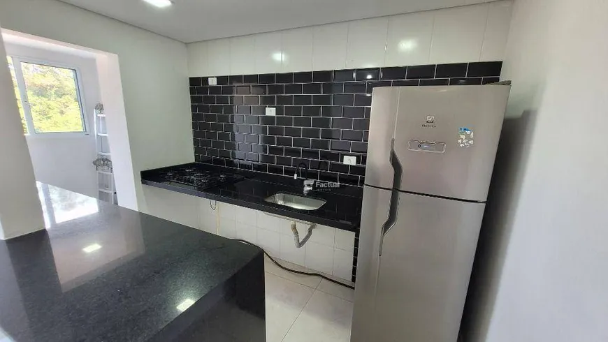 Foto 1 de Apartamento com 2 Quartos à venda, 59m² em Jardim dos Pássaros, Guarujá