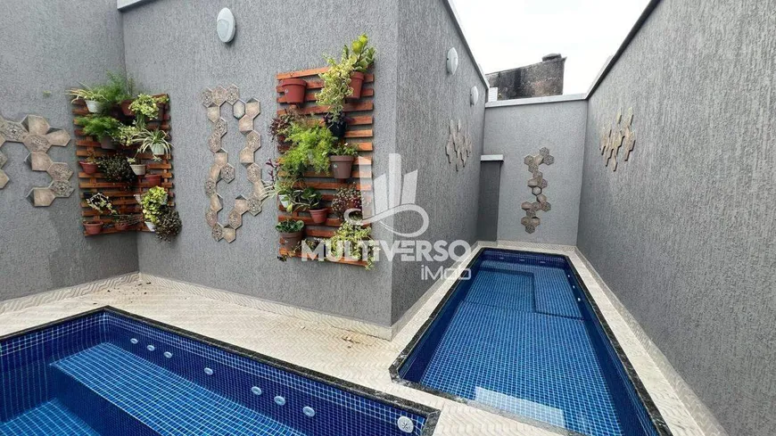Foto 1 de Casa com 2 Quartos à venda, 55m² em Maracanã, Praia Grande