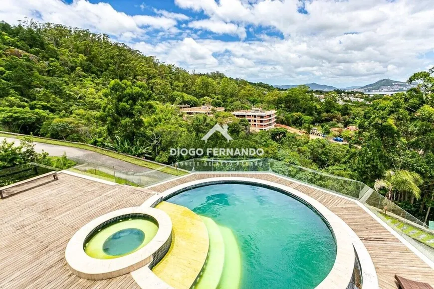 Foto 1 de Casa de Condomínio com 5 Quartos à venda, 1228m² em Cacupé, Florianópolis