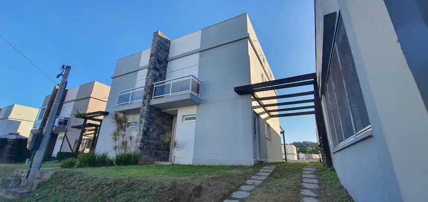 Foto 1 de Casa de Condomínio com 4 Quartos à venda, 199m² em Agronomia, Porto Alegre