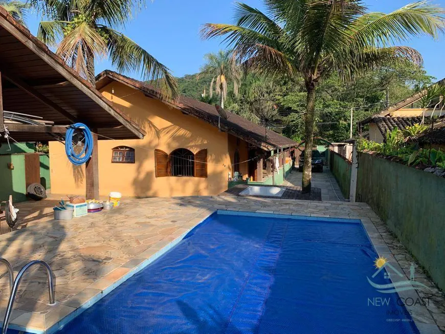 Foto 1 de Casa com 4 Quartos à venda, 246m² em Camburi, São Sebastião
