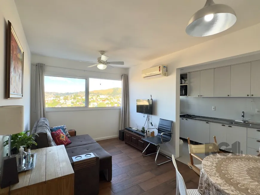 Foto 1 de Apartamento com 2 Quartos à venda, 56m² em Santo Antônio, Porto Alegre