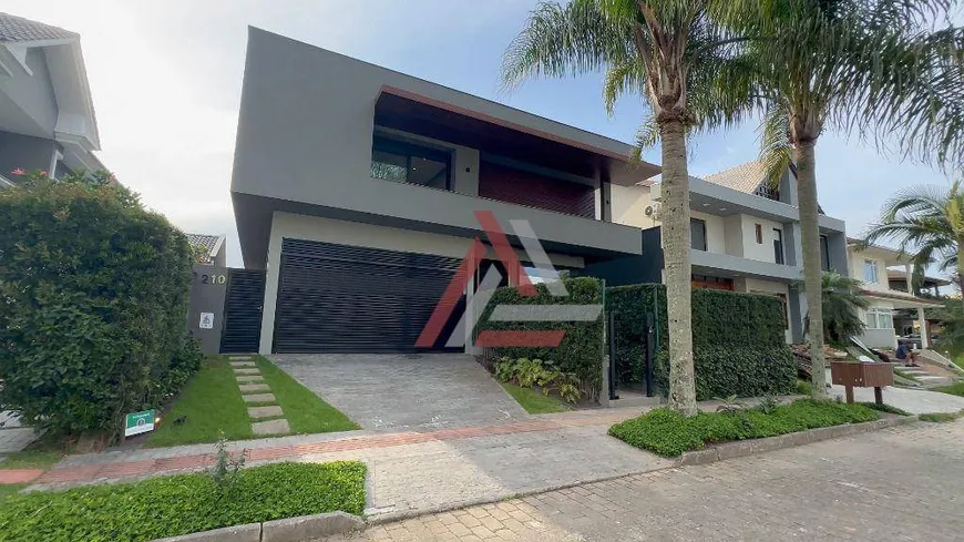 Foto 1 de Casa com 5 Quartos à venda, 355m² em Jurerê Internacional, Florianópolis