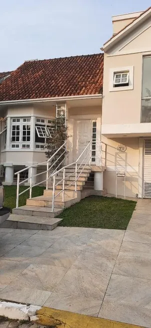 Foto 1 de Casa de Condomínio com 5 Quartos à venda, 178m² em Condominio Cantegril, Viamão