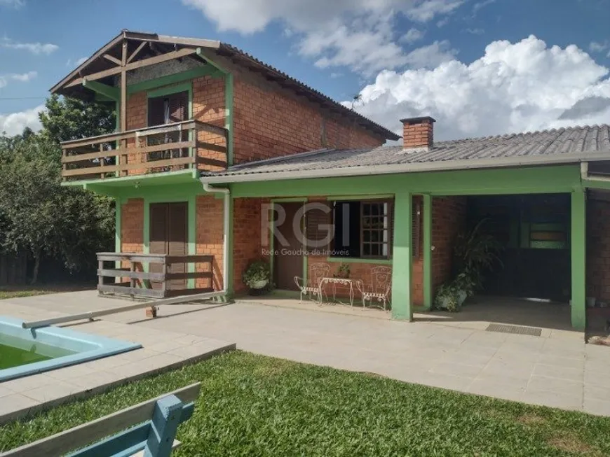 Foto 1 de Fazenda/Sítio com 4 Quartos à venda, 149m² em Costa Do Ipiranga, Gravataí