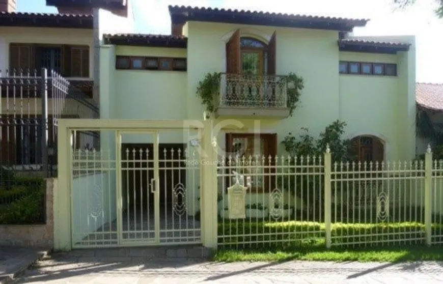 Foto 1 de Casa com 4 Quartos à venda, 299m² em Nonoai, Porto Alegre