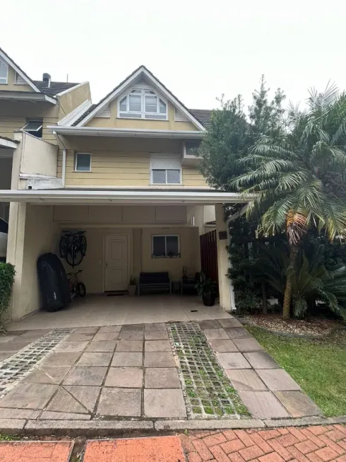 Foto 1 de Casa de Condomínio com 3 Quartos à venda, 183m² em Teresópolis, Porto Alegre