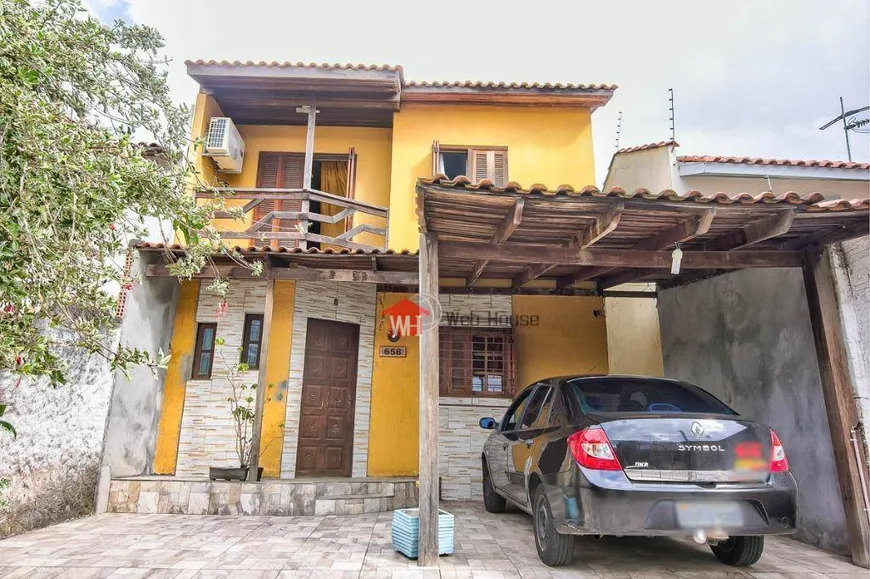 Foto 1 de Casa com 2 Quartos à venda, 102m² em Porto Verde, Alvorada