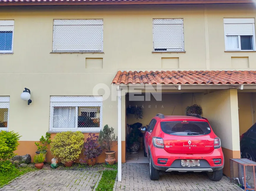 Foto 1 de Casa de Condomínio com 3 Quartos à venda, 88m² em Harmonia, Canoas