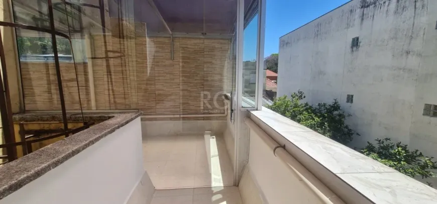 Foto 1 de Apartamento com 2 Quartos à venda, 94m² em Santo Antônio, Porto Alegre