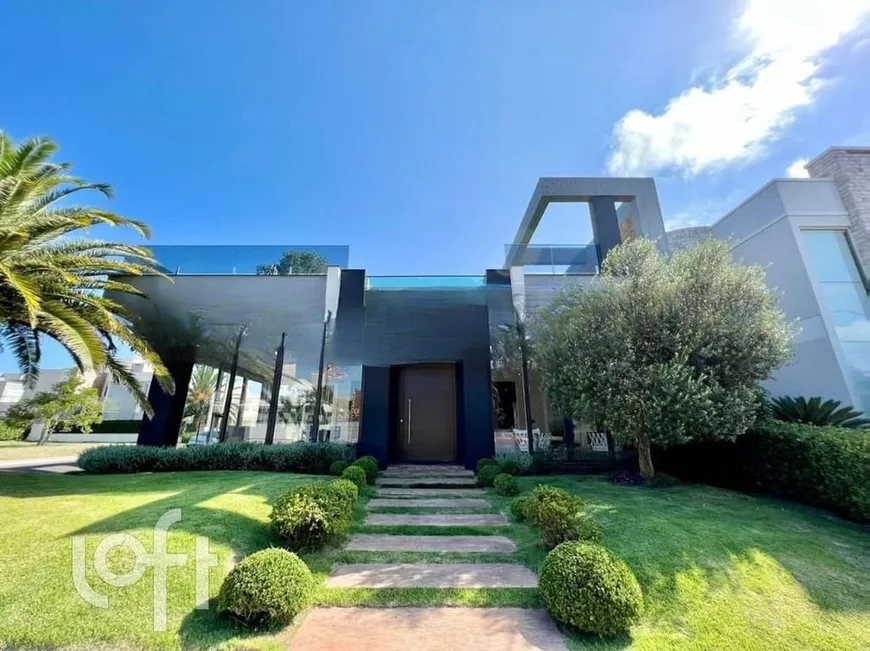 Foto 1 de Casa de Condomínio com 4 Quartos à venda, 450m² em Centro, Capão da Canoa