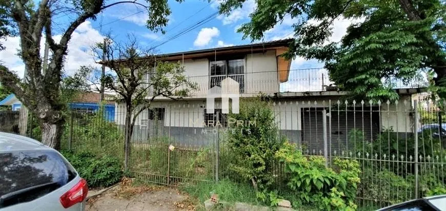 Foto 1 de Casa com 4 Quartos à venda, 419m² em Uberaba, Curitiba