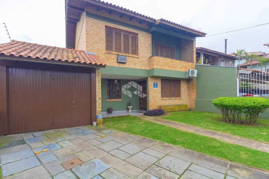 Foto 1 de Casa com 4 Quartos à venda, 202m² em Ipanema, Porto Alegre