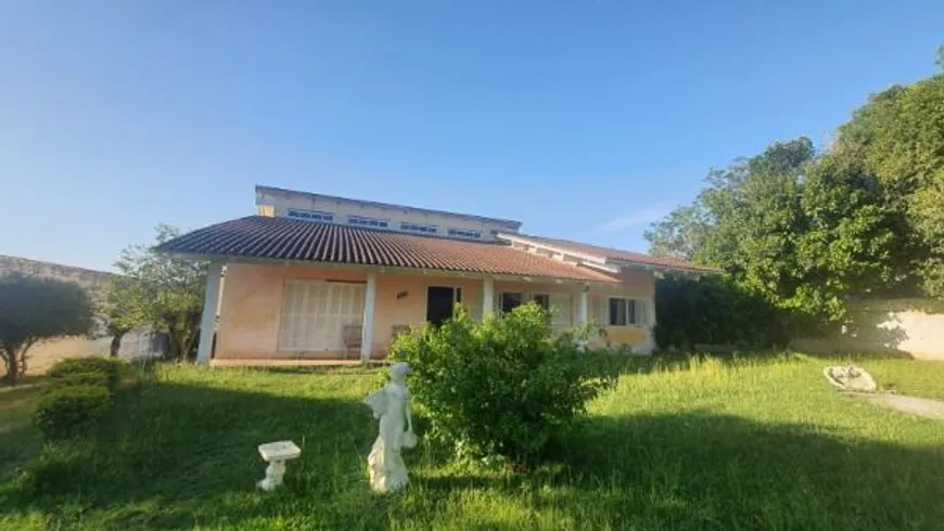 Foto 1 de Casa com 3 Quartos à venda, 300m² em Vila Nova, Porto Alegre