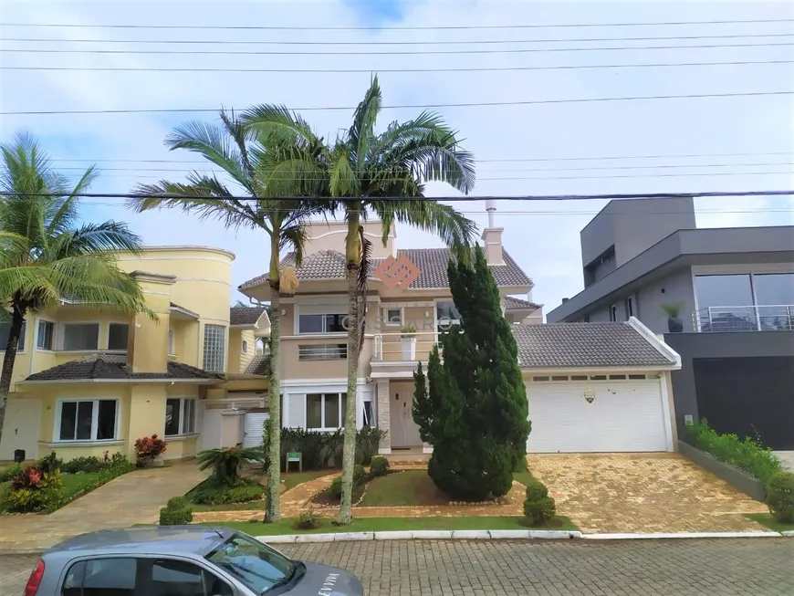 Foto 1 de Casa com 4 Quartos à venda, 257m² em Jurerê Internacional, Florianópolis