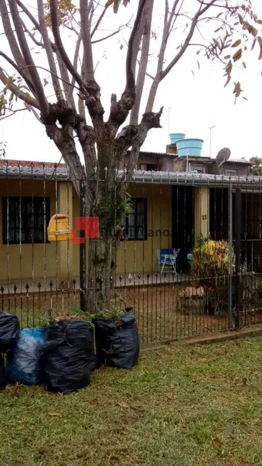 Foto 1 de Casa com 2 Quartos à venda, 100m² em Guajuviras, Canoas