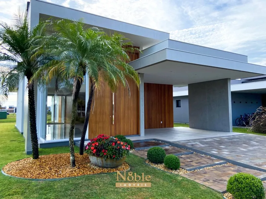 Foto 1 de Casa de Condomínio com 4 Quartos à venda, 205m² em Centro, Torres