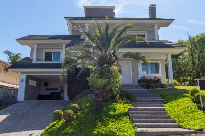 Foto 1 de Casa de Condomínio com 3 Quartos à venda, 349m² em Cacupé, Florianópolis