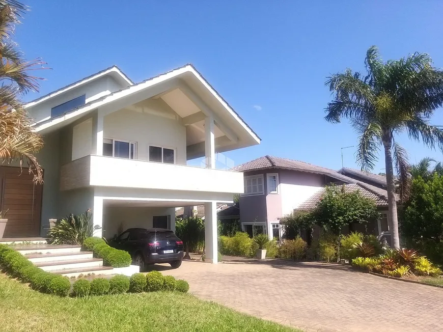 Foto 1 de Casa de Condomínio com 3 Quartos à venda, 357m² em Tarumã, Viamão