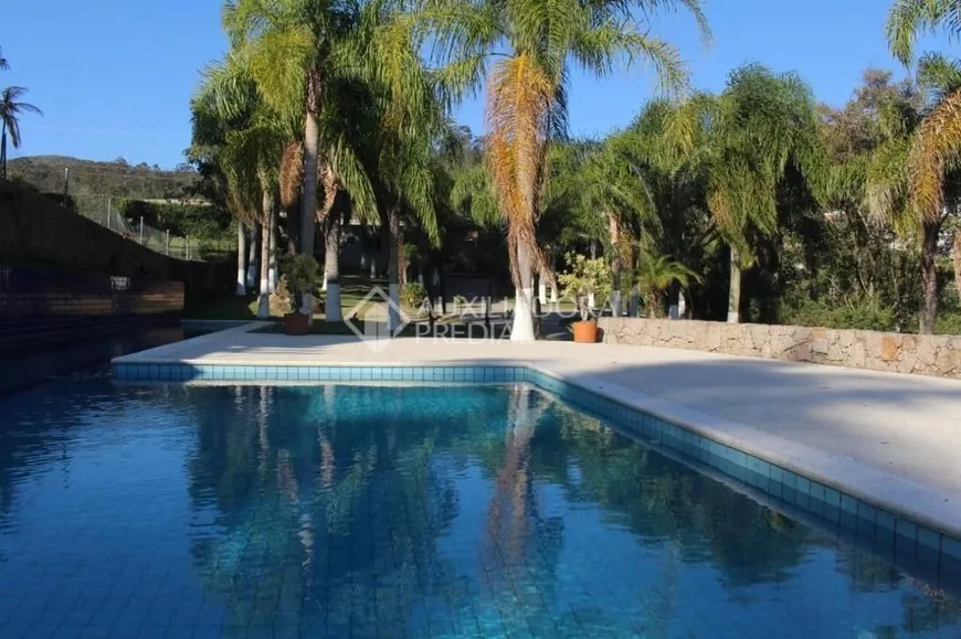 Foto 1 de Casa com 7 Quartos à venda, 1000m² em Cacupé, Florianópolis