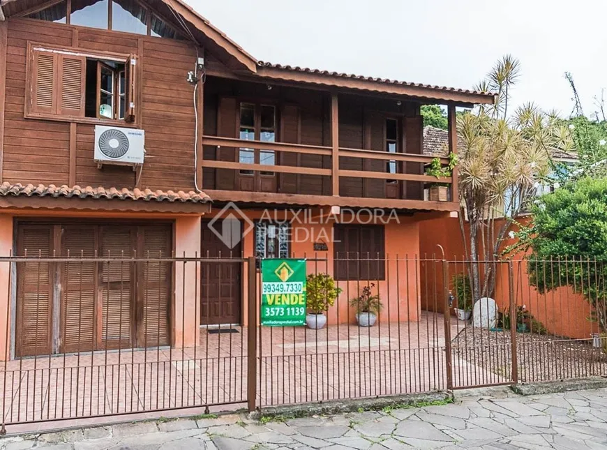 Foto 1 de Casa com 4 Quartos à venda, 107m² em Tristeza, Porto Alegre