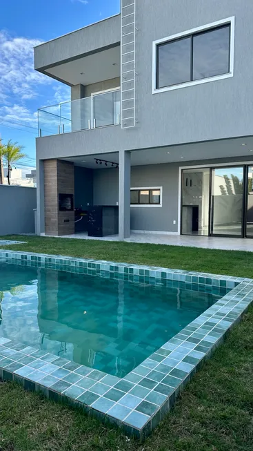 Foto 1 de Casa de Condomínio com 4 Quartos à venda, 235m² em Cidade Alpha, Eusébio