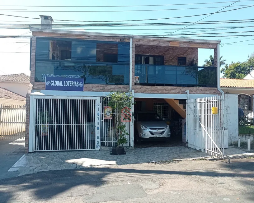 Foto 1 de Sobrado com 4 Quartos à venda, 220m² em Santa Felicidade, Curitiba